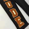 Rhude brown letters pants black